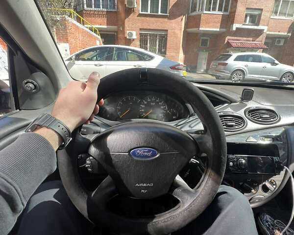 Красный Форд Фокус, объемом двигателя 1.8 л и пробегом 250 тыс. км за 2999 $, фото 11 на Automoto.ua