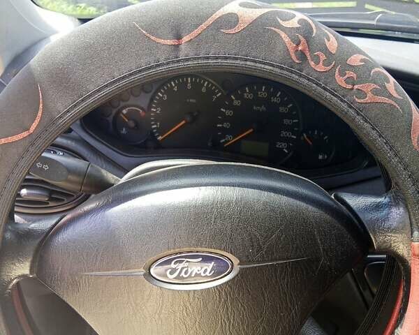 Красный Форд Фокус, объемом двигателя 1.8 л и пробегом 361 тыс. км за 2800 $, фото 17 на Automoto.ua