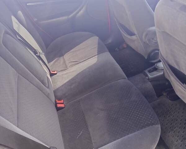 Красный Форд Фокус, объемом двигателя 1.8 л и пробегом 361 тыс. км за 2800 $, фото 9 на Automoto.ua