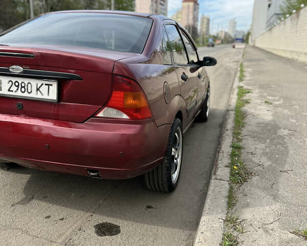 Красный Форд Фокус, объемом двигателя 1.8 л и пробегом 250 тыс. км за 2999 $, фото 4 на Automoto.ua