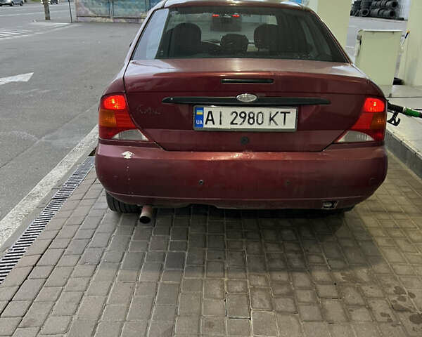 Красный Форд Фокус, объемом двигателя 1.8 л и пробегом 250 тыс. км за 2999 $, фото 6 на Automoto.ua