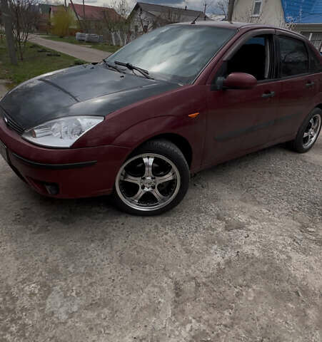 Красный Форд Фокус, объемом двигателя 1.8 л и пробегом 250 тыс. км за 2999 $, фото 3 на Automoto.ua