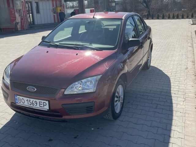 Красный Форд Фокус, объемом двигателя 1.6 л и пробегом 185 тыс. км за 3850 $, фото 1 на Automoto.ua