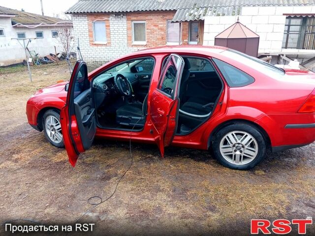 Красный Форд Фокус, объемом двигателя 1.6 л и пробегом 370 тыс. км за 4100 $, фото 6 на Automoto.ua