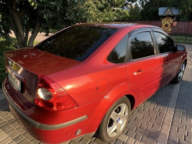 Красный Форд Фокус, объемом двигателя 1.6 л и пробегом 204 тыс. км за 4300 $, фото 3 на Automoto.ua