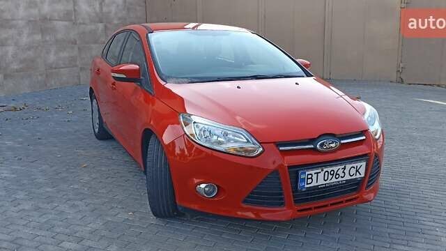 Красный Форд Фокус, объемом двигателя 2 л и пробегом 169 тыс. км за 7650 $, фото 7 на Automoto.ua