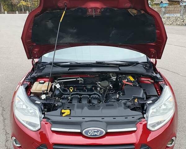 Червоний Форд Фокус, об'ємом двигуна 2 л та пробігом 184 тис. км за 8600 $, фото 12 на Automoto.ua