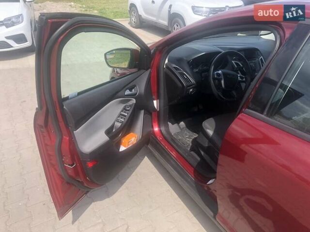 Красный Форд Фокус, объемом двигателя 2 л и пробегом 160 тыс. км за 6700 $, фото 11 на Automoto.ua