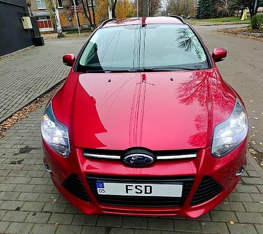 Красный Форд Фокус, объемом двигателя 1.6 л и пробегом 26 тыс. км за 13000 $, фото 2 на Automoto.ua