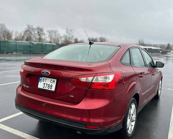 Красный Форд Фокус, объемом двигателя 2 л и пробегом 160 тыс. км за 6450 $, фото 6 на Automoto.ua