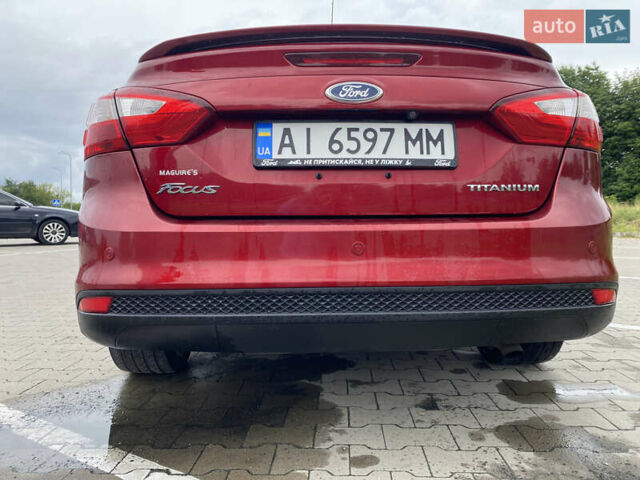 Червоний Форд Фокус, об'ємом двигуна 2 л та пробігом 151 тис. км за 8400 $, фото 12 на Automoto.ua