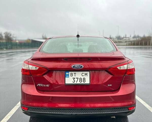 Красный Форд Фокус, объемом двигателя 2 л и пробегом 160 тыс. км за 6450 $, фото 5 на Automoto.ua