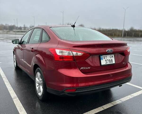 Красный Форд Фокус, объемом двигателя 2 л и пробегом 160 тыс. км за 6450 $, фото 4 на Automoto.ua