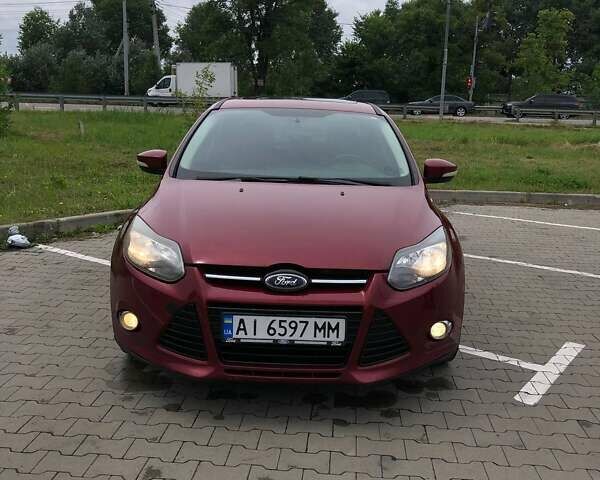 Червоний Форд Фокус, об'ємом двигуна 2 л та пробігом 151 тис. км за 8400 $, фото 1 на Automoto.ua