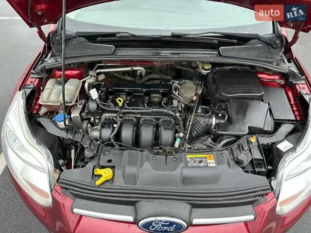 Красный Форд Фокус, объемом двигателя 2 л и пробегом 160 тыс. км за 6450 $, фото 12 на Automoto.ua