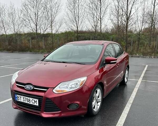 Красный Форд Фокус, объемом двигателя 2 л и пробегом 160 тыс. км за 6450 $, фото 1 на Automoto.ua