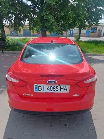 Красный Форд Фокус, объемом двигателя 2 л и пробегом 100 тыс. км за 7700 $, фото 5 на Automoto.ua