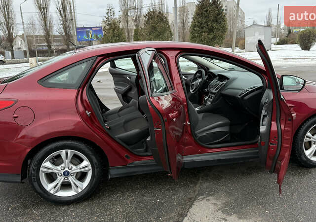 Червоний Форд Фокус, об'ємом двигуна 2 л та пробігом 139 тис. км за 8159 $, фото 9 на Automoto.ua
