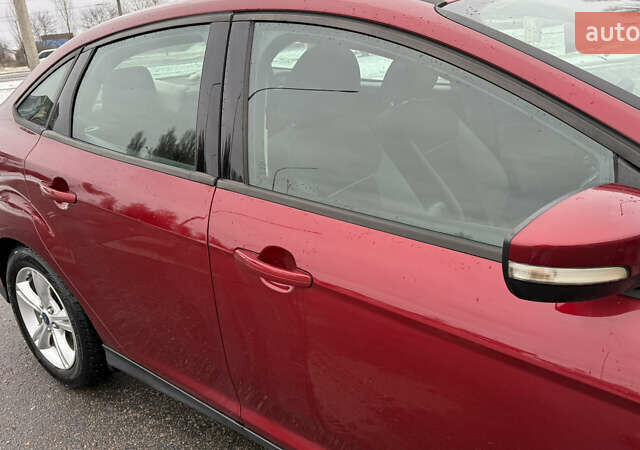 Червоний Форд Фокус, об'ємом двигуна 2 л та пробігом 139 тис. км за 8159 $, фото 4 на Automoto.ua