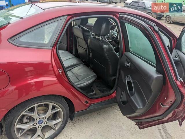 Красный Форд Фокус, объемом двигателя 2 л и пробегом 201 тыс. км за 7650 $, фото 5 на Automoto.ua