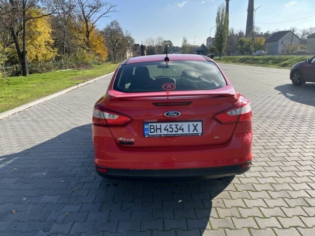Красный Форд Фокус, объемом двигателя 2 л и пробегом 247 тыс. км за 7000 $, фото 3 на Automoto.ua