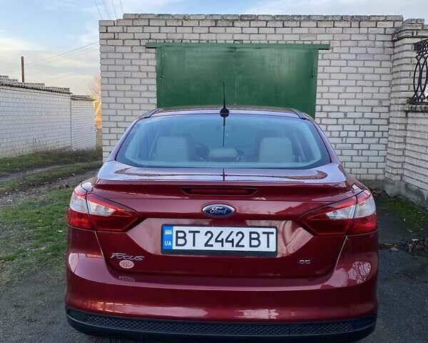 Червоний Форд Фокус, об'ємом двигуна 2 л та пробігом 102 тис. км за 6800 $, фото 5 на Automoto.ua