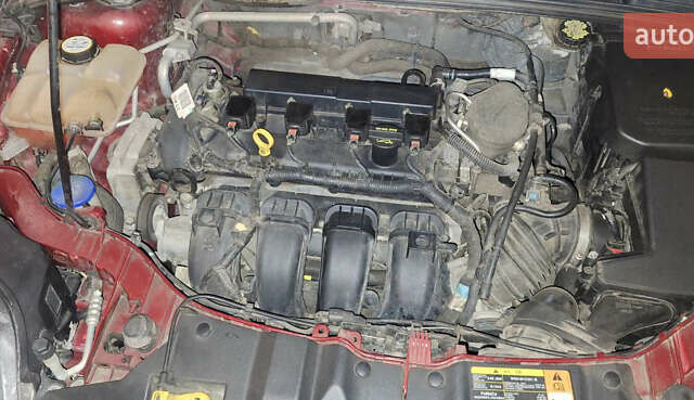 Красный Форд Фокус, объемом двигателя 2 л и пробегом 130 тыс. км за 9300 $, фото 23 на Automoto.ua