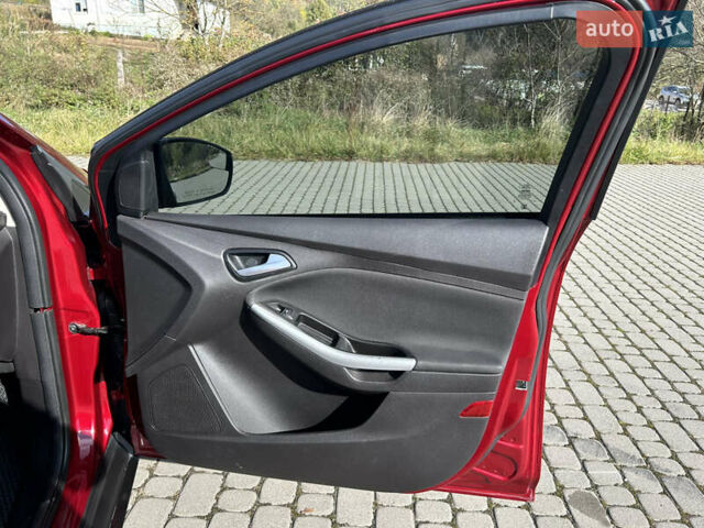 Червоний Форд Фокус, об'ємом двигуна 2 л та пробігом 165 тис. км за 7100 $, фото 21 на Automoto.ua