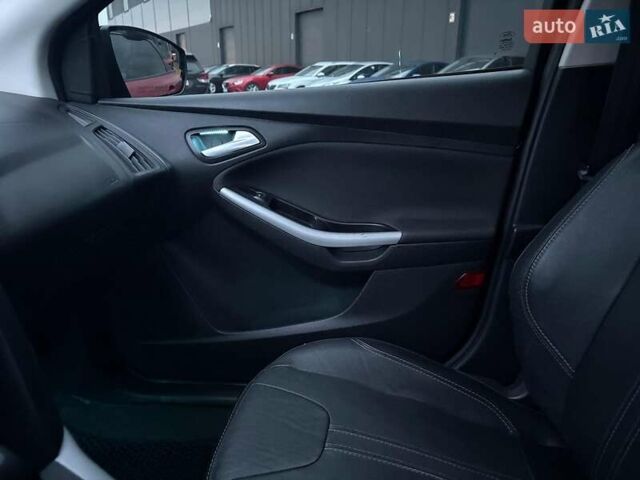 Червоний Форд Фокус, об'ємом двигуна 2 л та пробігом 166 тис. км за 7790 $, фото 26 на Automoto.ua