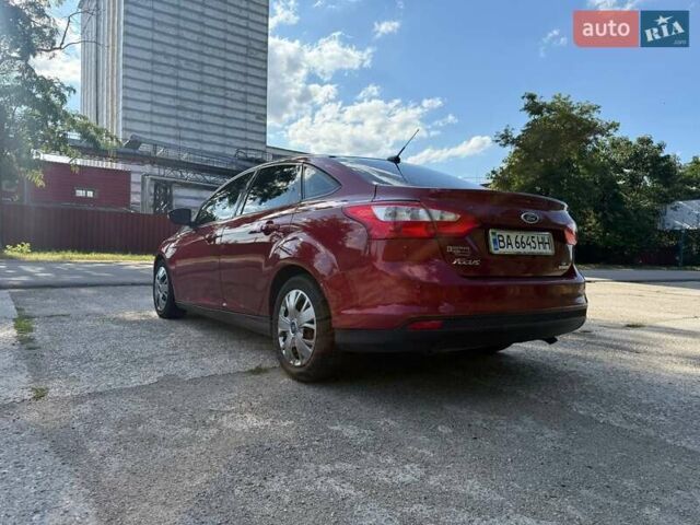 Красный Форд Фокус, объемом двигателя 2 л и пробегом 170 тыс. км за 6300 $, фото 1 на Automoto.ua