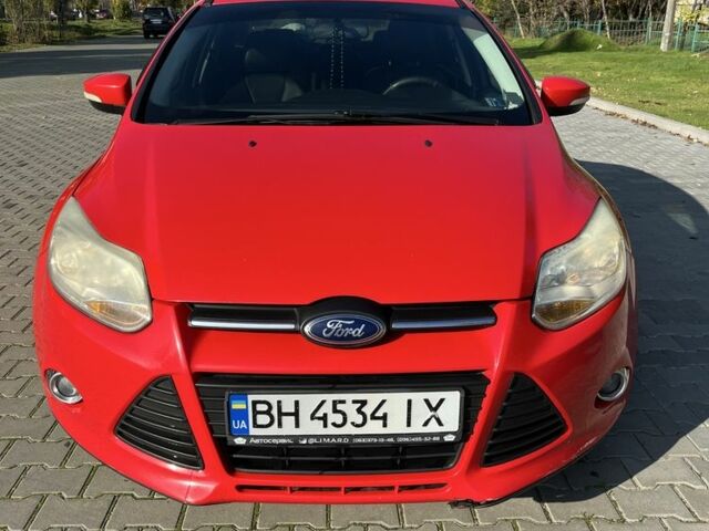 Красный Форд Фокус, объемом двигателя 2 л и пробегом 247 тыс. км за 7000 $, фото 5 на Automoto.ua