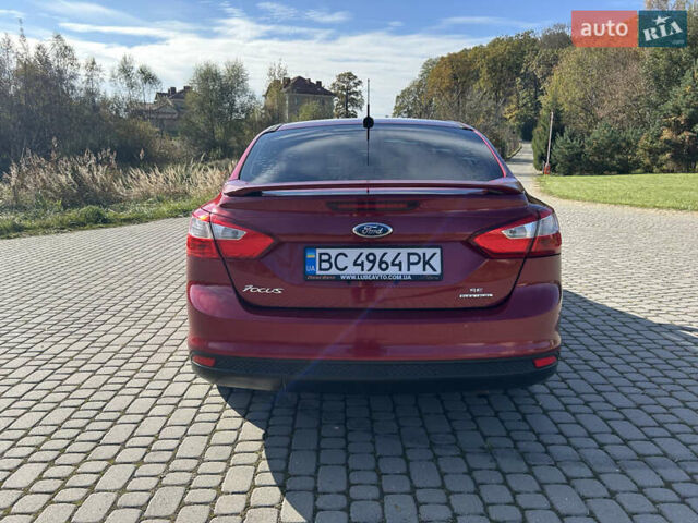 Червоний Форд Фокус, об'ємом двигуна 2 л та пробігом 165 тис. км за 7100 $, фото 14 на Automoto.ua