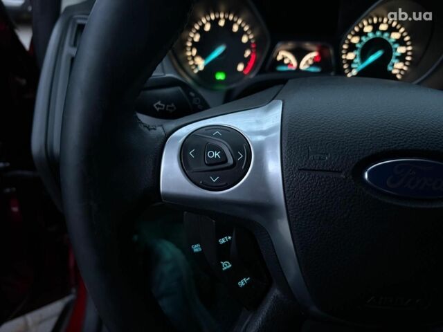 Червоний Форд Фокус, об'ємом двигуна 2 л та пробігом 166 тис. км за 7790 $, фото 22 на Automoto.ua