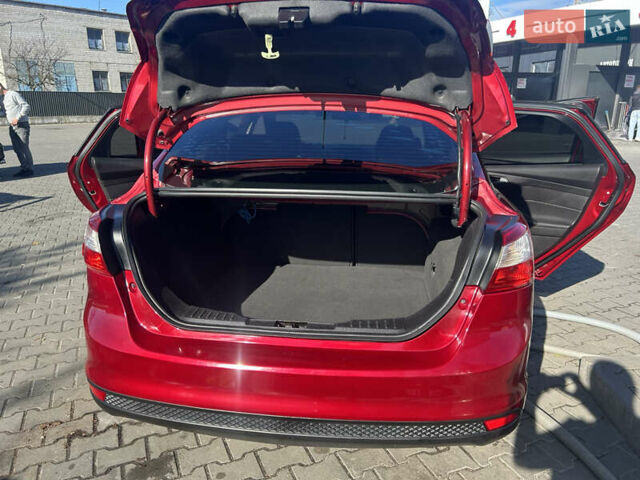 Червоний Форд Фокус, об'ємом двигуна 2 л та пробігом 165 тис. км за 7100 $, фото 25 на Automoto.ua