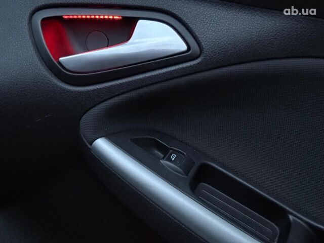 Червоний Форд Фокус, об'ємом двигуна 2 л та пробігом 166 тис. км за 7790 $, фото 33 на Automoto.ua