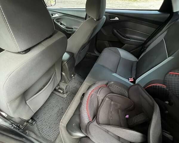 Красный Форд Фокус, объемом двигателя 2 л и пробегом 127 тыс. км за 7700 $, фото 10 на Automoto.ua