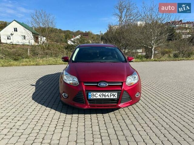 Червоний Форд Фокус, об'ємом двигуна 2 л та пробігом 165 тис. км за 7100 $, фото 1 на Automoto.ua