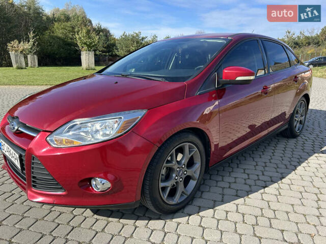 Червоний Форд Фокус, об'ємом двигуна 2 л та пробігом 165 тис. км за 7100 $, фото 5 на Automoto.ua