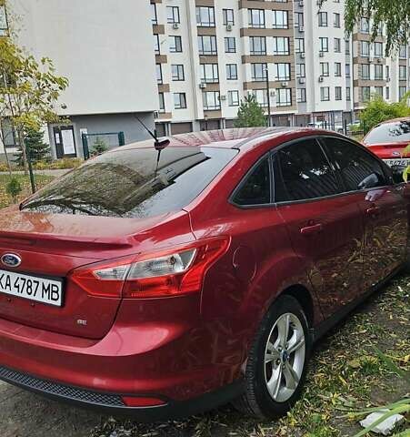 Червоний Форд Фокус, об'ємом двигуна 2 л та пробігом 130 тис. км за 7200 $, фото 4 на Automoto.ua