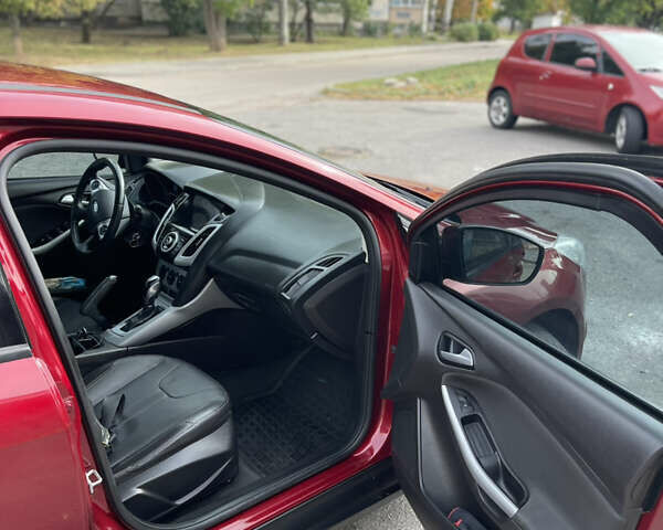 Красный Форд Фокус, объемом двигателя 2 л и пробегом 206 тыс. км за 6500 $, фото 7 на Automoto.ua