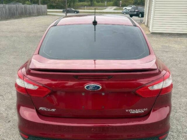 Красный Форд Фокус, объемом двигателя 2 л и пробегом 80 тыс. км за 3600 $, фото 4 на Automoto.ua