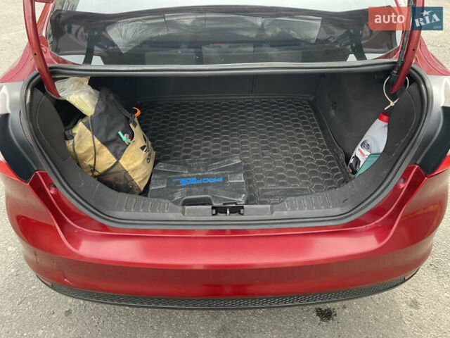 Красный Форд Фокус, объемом двигателя 2 л и пробегом 206 тыс. км за 6500 $, фото 10 на Automoto.ua