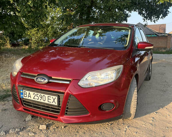 Красный Форд Фокус, объемом двигателя 2 л и пробегом 151 тыс. км за 7500 $, фото 1 на Automoto.ua