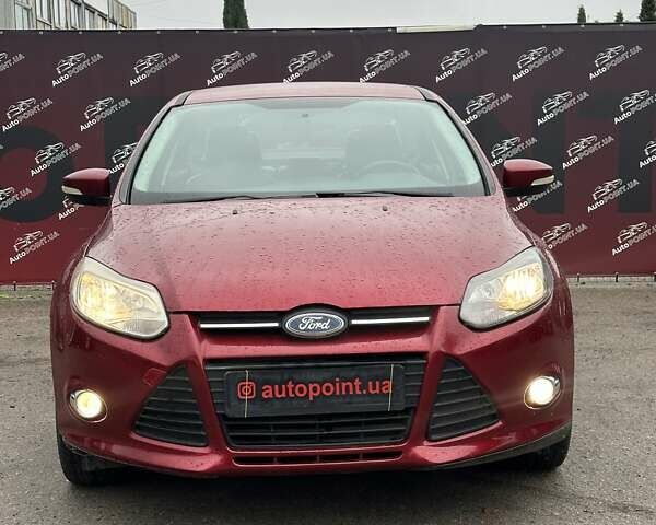 Красный Форд Фокус, объемом двигателя 2 л и пробегом 146 тыс. км за 8200 $, фото 1 на Automoto.ua