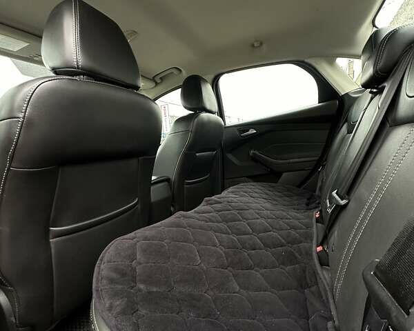 Красный Форд Фокус, объемом двигателя 2 л и пробегом 146 тыс. км за 8200 $, фото 21 на Automoto.ua