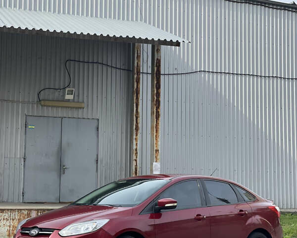 Красный Форд Фокус, объемом двигателя 2 л и пробегом 206 тыс. км за 6500 $, фото 4 на Automoto.ua