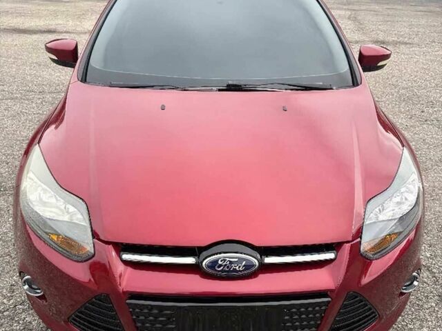 Червоний Форд Фокус, об'ємом двигуна 2 л та пробігом 89 тис. км за 8000 $, фото 1 на Automoto.ua