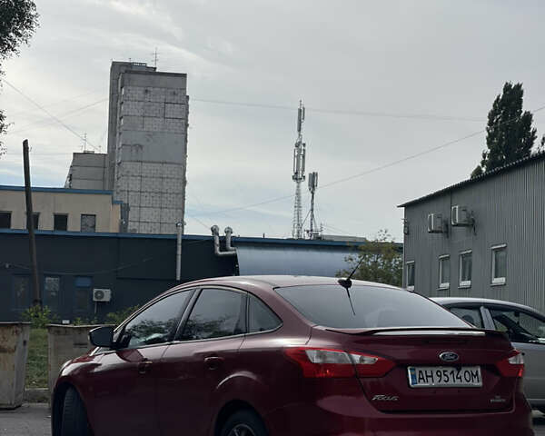 Красный Форд Фокус, объемом двигателя 2 л и пробегом 206 тыс. км за 6500 $, фото 3 на Automoto.ua