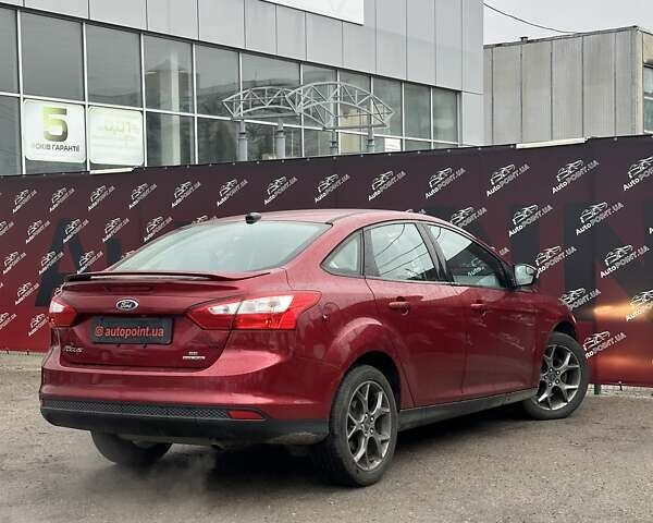Красный Форд Фокус, объемом двигателя 2 л и пробегом 146 тыс. км за 8200 $, фото 7 на Automoto.ua