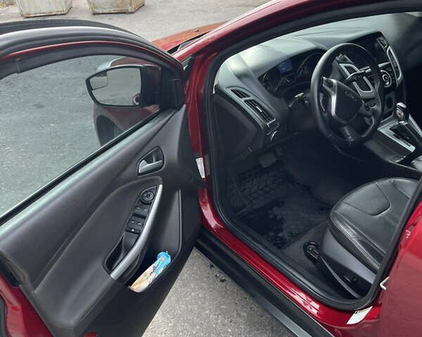 Красный Форд Фокус, объемом двигателя 2 л и пробегом 206 тыс. км за 6500 $, фото 5 на Automoto.ua